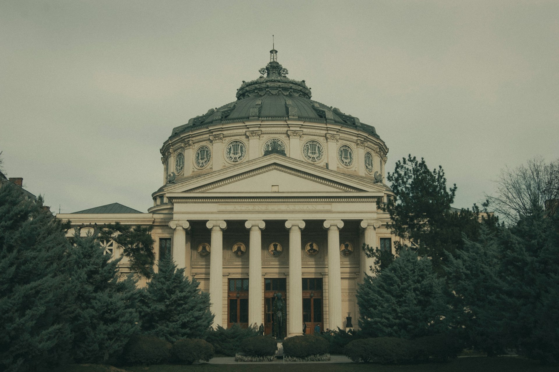 Grand neoclassical building with a dome and columns.